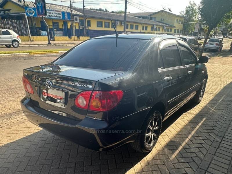 TOYOTA - COROLLA - 2002/2003 - Preta - R$ 33.900,00