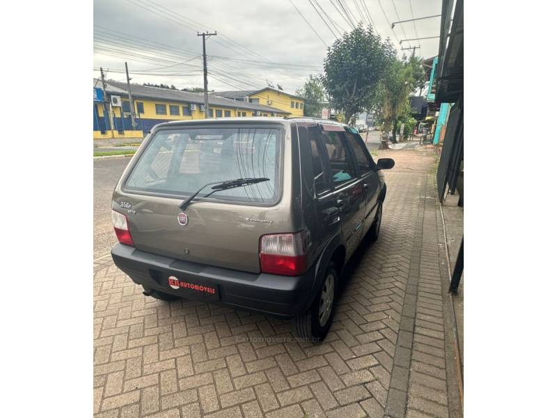 FIAT - UNO - 2010/2011 - Cinza - R$ 27.900,00